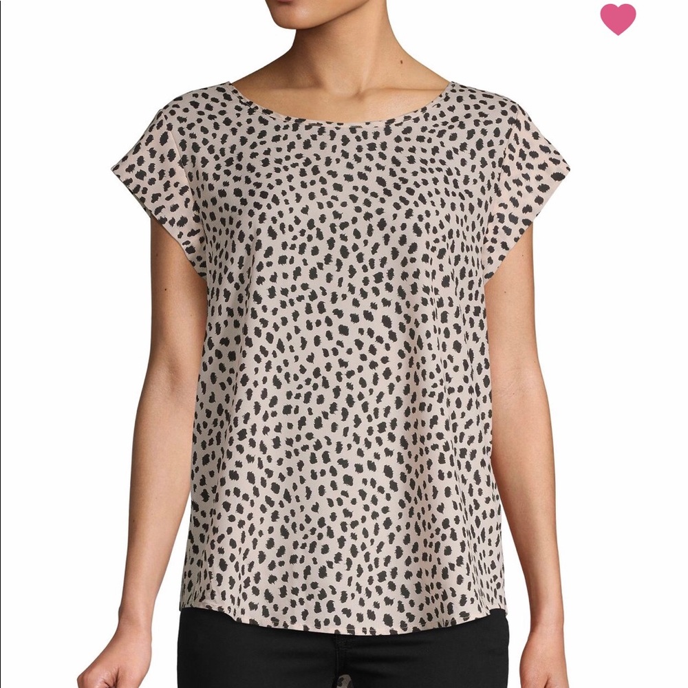 Cap-sleeve top with allover print. • Roundneck
